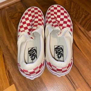 Red checkered slip on vans.